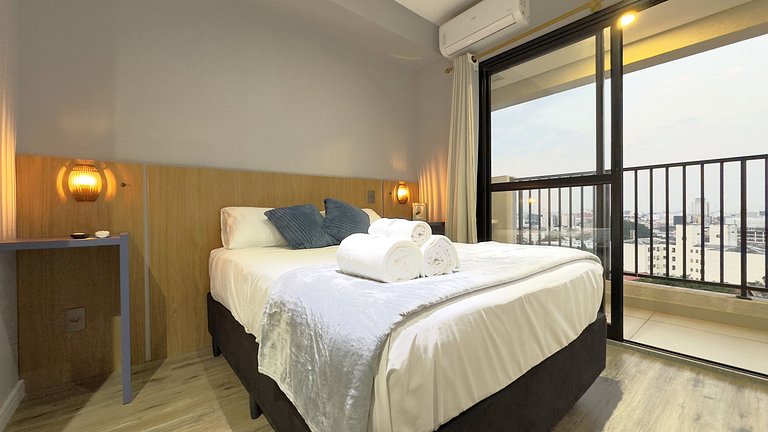 Studio em frente ao Metrô + Piscina e Rooftop